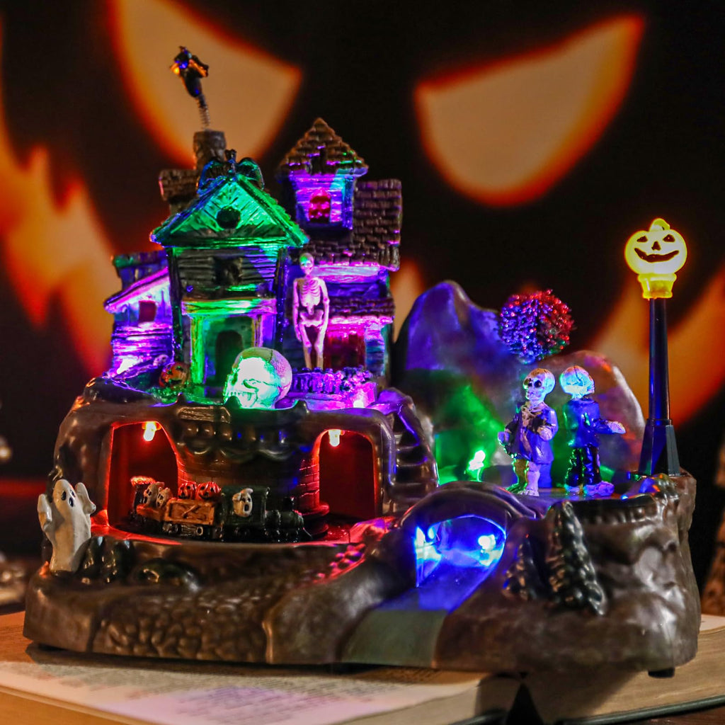 DREAM GARDEN Halloween Village Collection, Lighted Spooky Haunted House with Animated Train and Scary Sound Halloween Collectible Bulidings with Skull, Pumpkin, Ghost for Holiday Party Tabletop Decor - Halloween Happy