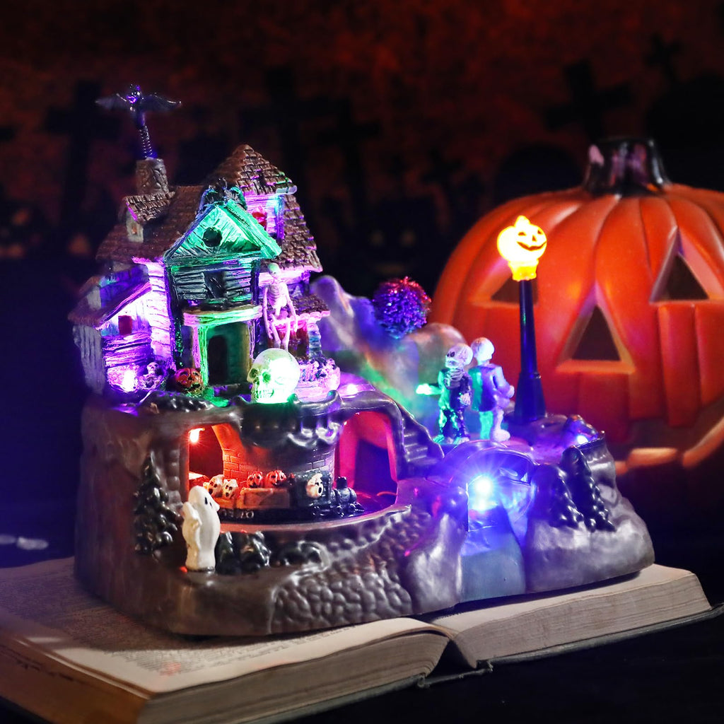 Halloween Village Houses Decorations, Lighted Haunted House with Animated Train and Scary Music, Resin Spooky Skull Village Collections for Holiday Party Table Indoor Home Decor - Halloween Happy